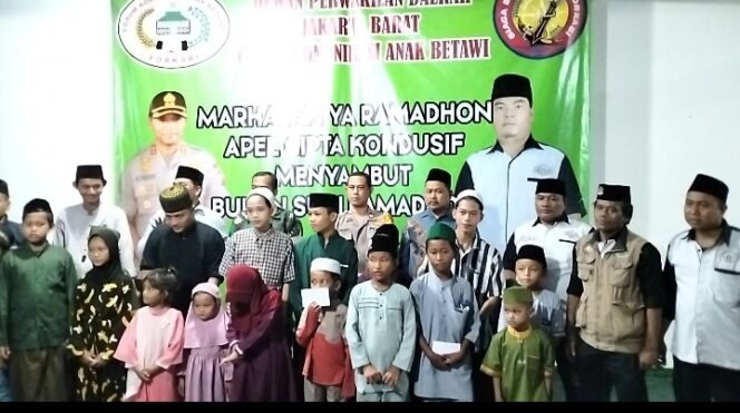 
 H.Sarmilih Ketua DPD Forum Komunikasi Anak Betawi Jakbar, Mengadakan Apel Siaga dan Membagikan Santunan