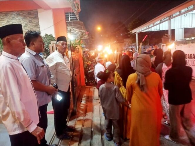 
 Sambut Tahun Baru Islam 1445 H/2023 M, LPM Kelurahan Cimpaeun Tapos Adakan Pawai Obor Keliling
