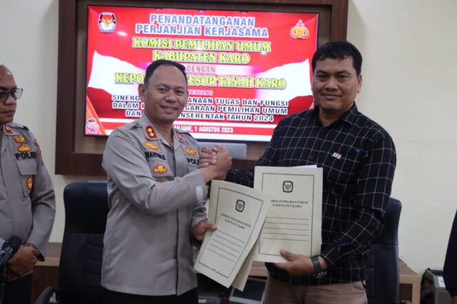 
 Polres Tanah Karo Tandatangani Perjanjian Kerjasama Dengan KPU Karo