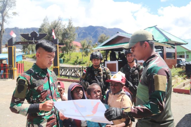 
 Satgas Yonif PR 330 Tri Dharma Bangkitkan Motivasi Belajar Anak Sekolah